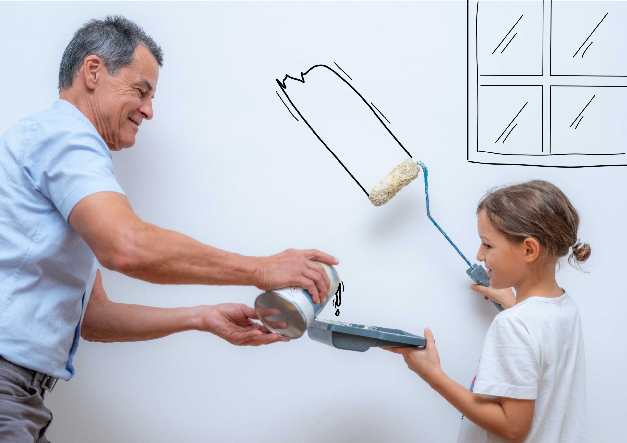 Erwachsener streicht mit Kind eine illustrierte Wand
